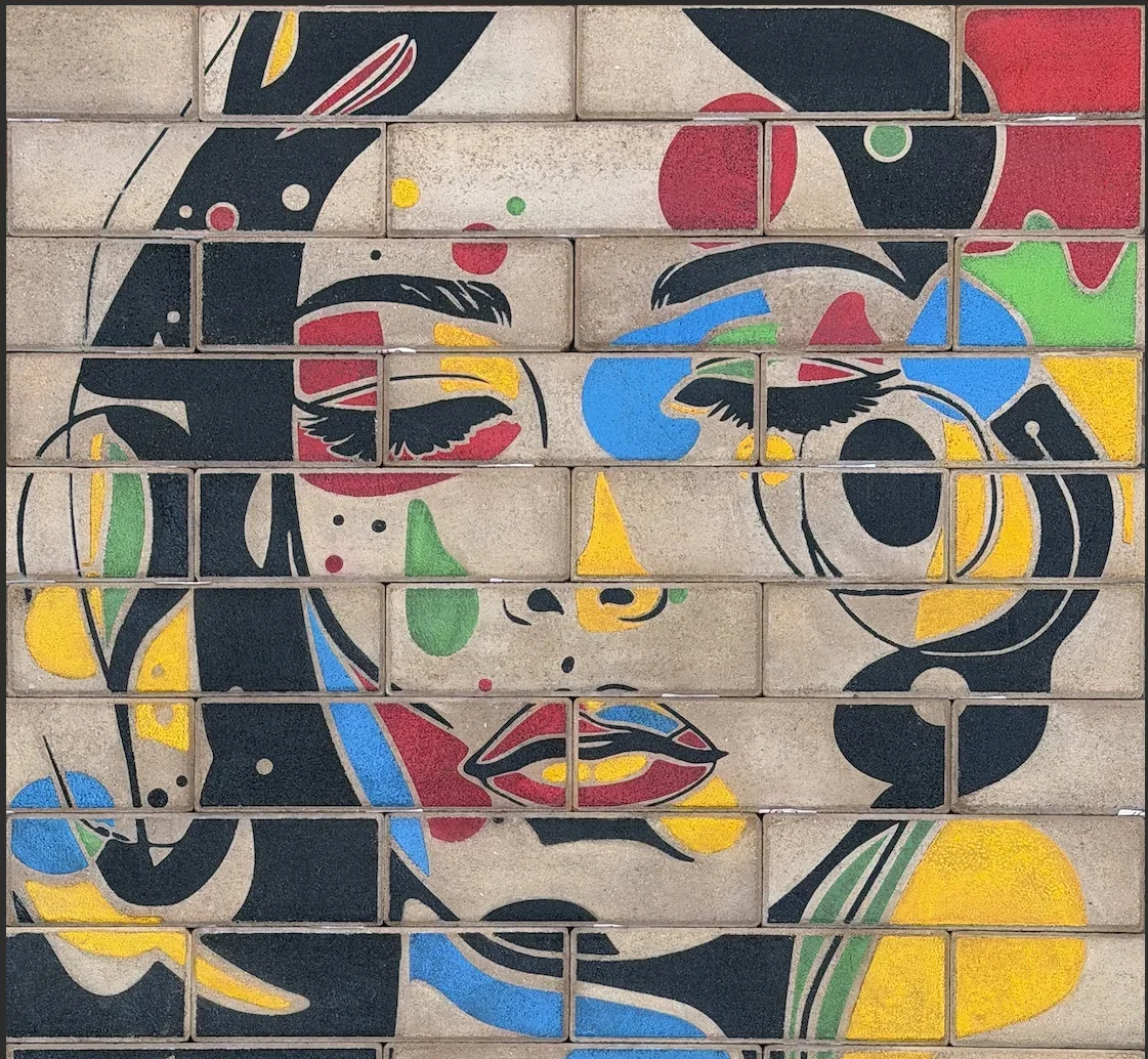Decorative thin brick wall depicting a stylized woman