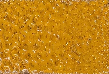 Yellow laser-pigmented texture sample