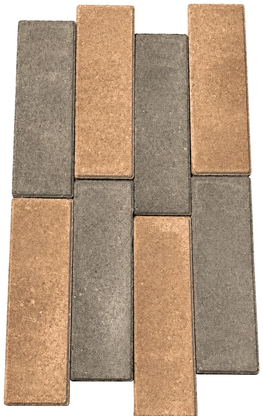 Natural and dark custom-color thin brick samples arranged for finish comparison
